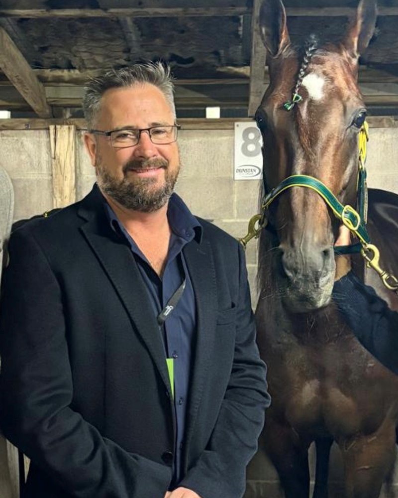 Glenn Holland with a yearling in the stables