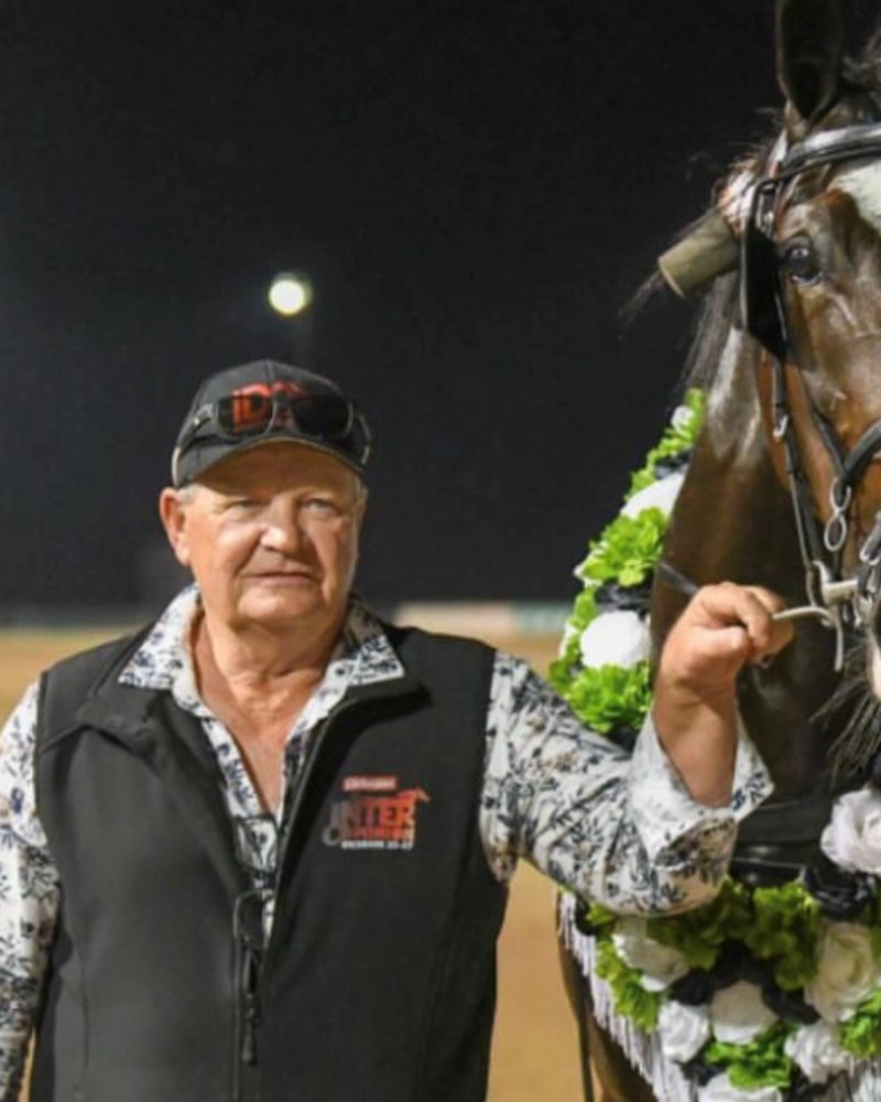 Mick Boots with a garlanded winner